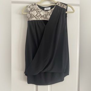 Very body flattering silk shirt by Bailey.
